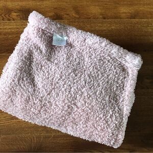 Pink fuzzy toddler blanket